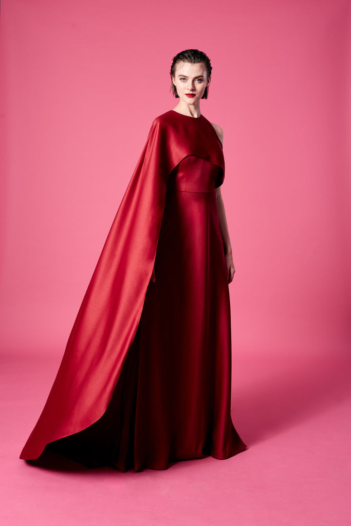 16.	Red cape-effect dress