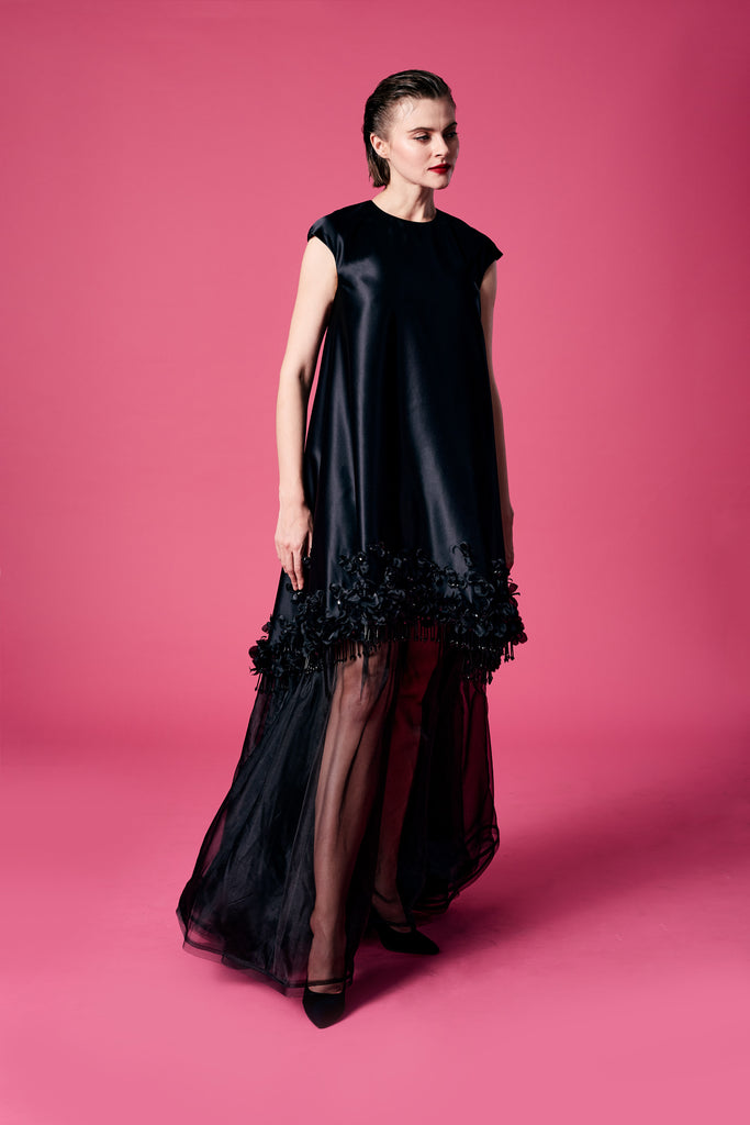 19.	Black dress with black flowers embellishment