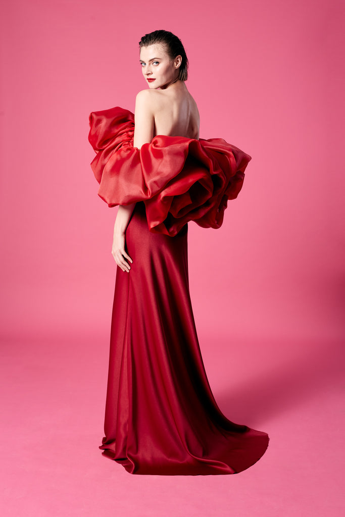 01.	Appliquéd with an oversized organza rose dress.